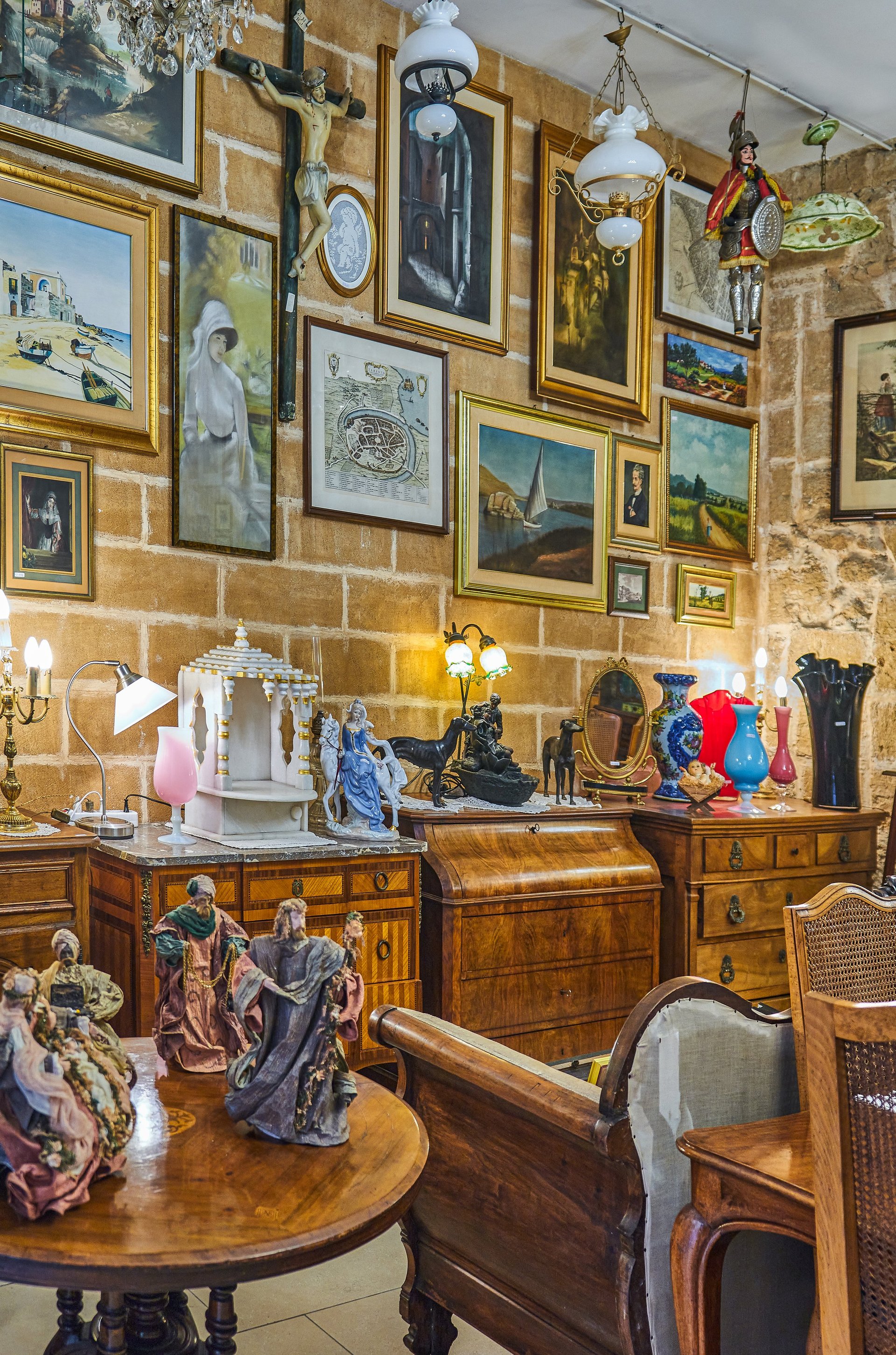 Antique shop in old town with warm lighting and wooden furniture display