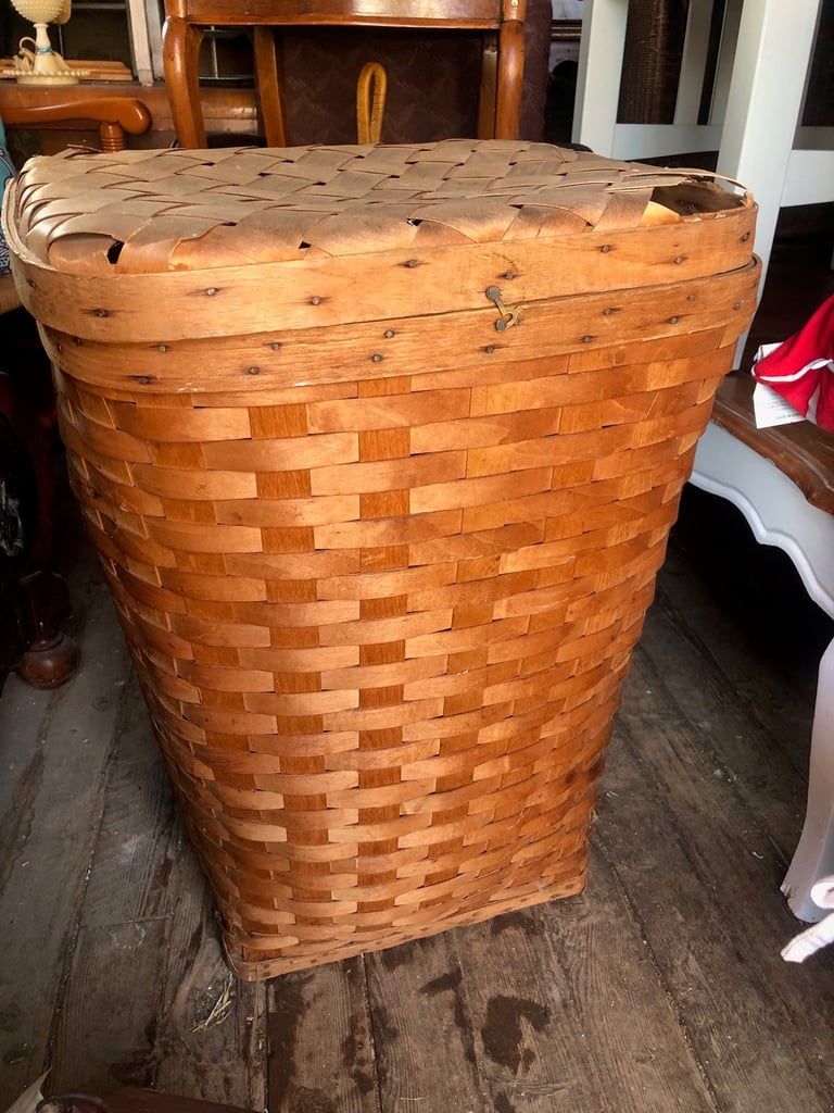 Large woven wicker basket with lid and cloth lining